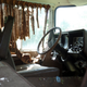 An abandoned RV, complete with pots, pans, and other belongings left behind.